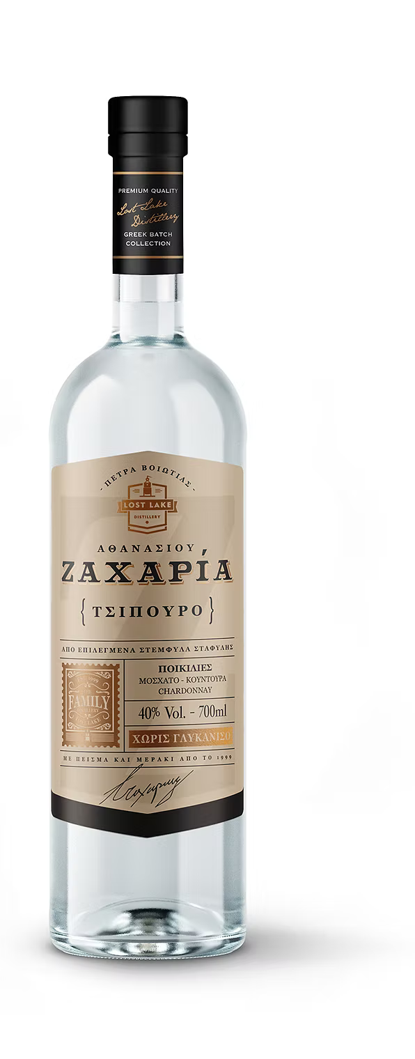 Bottle of Lost Lake Distillery Tsipouro 0.7L with clear liquid and elegant label design on a neutral background.